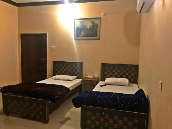 Babar House Otel Faysalabad Dış mekan fotoğraf